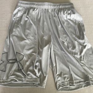 Under Armor, size medium, color is silver.